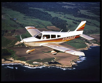 Air-to-air photo of a Piper Warrior
